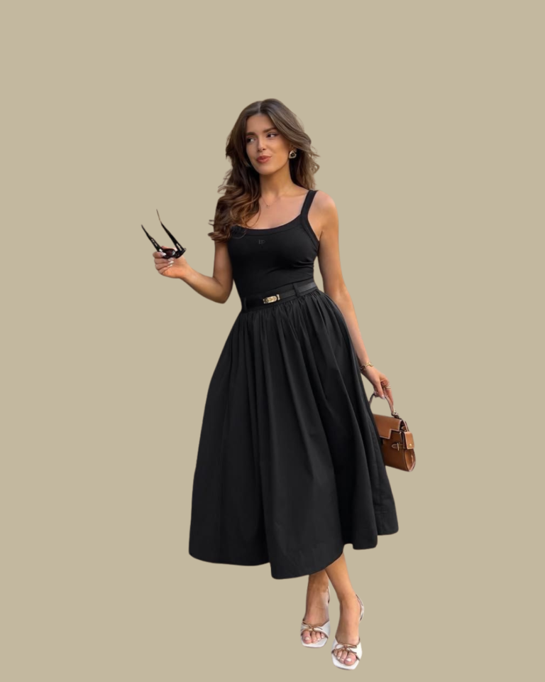 Woman wearing a fitted light beige sleeveless vest with gold buttons, a white wide-leg midi skirt, a light brown bucket handbag, and nude high-heels.